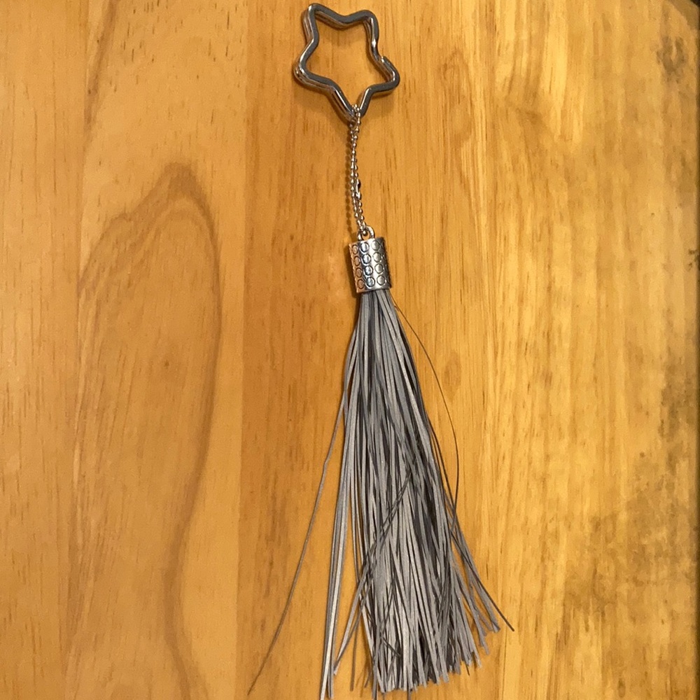Shooting star keychain with reflective tassel